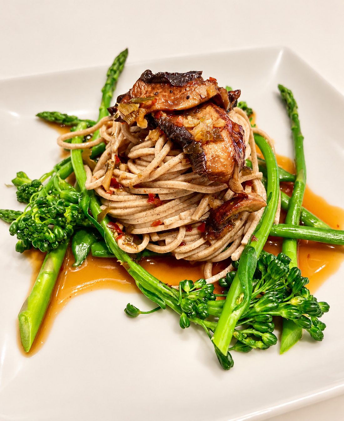 Soba noodles with glazed mushrooms, asparagus and broccolini